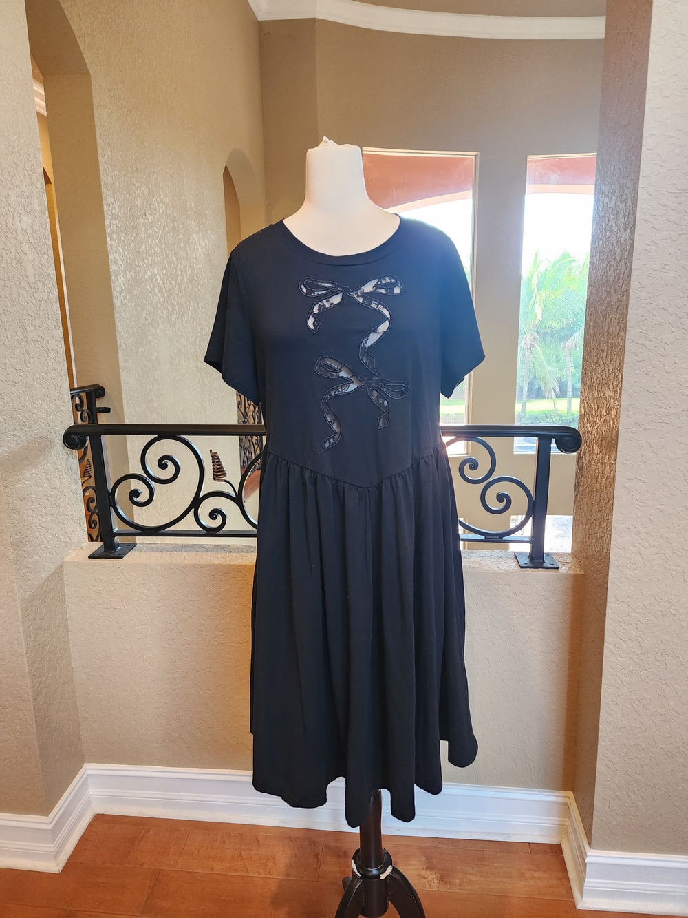 Cider Black Short-Sleeve Midi Dress with Bow Appliqués